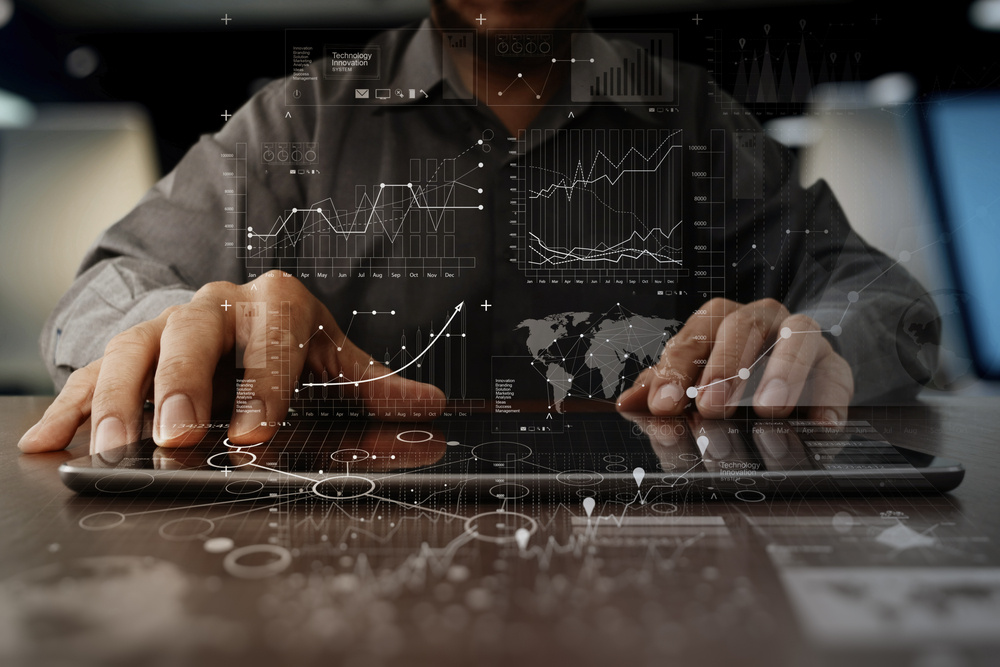 businessman hand working on laptop computer with digital layer business strategy and social media diagram on wooden desk-2